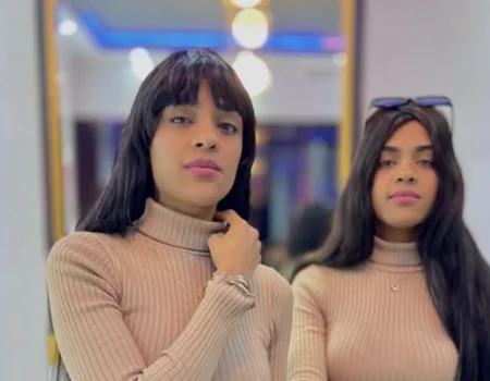 Modeliito Las Mellas posing in coordinated outfits, showcasing their unique twin influencer style.